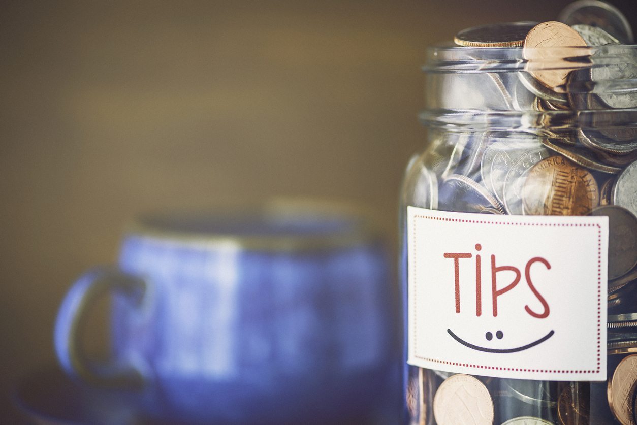 Tip jar in coffee shop or restaurant