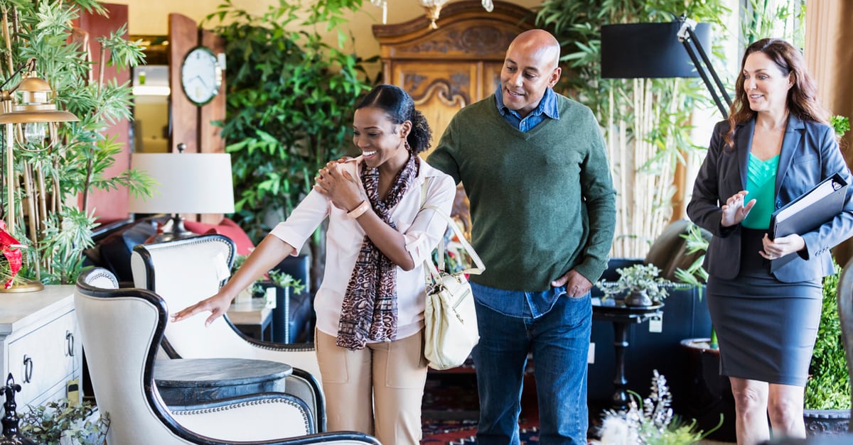 Couple looking at new furniture to buy