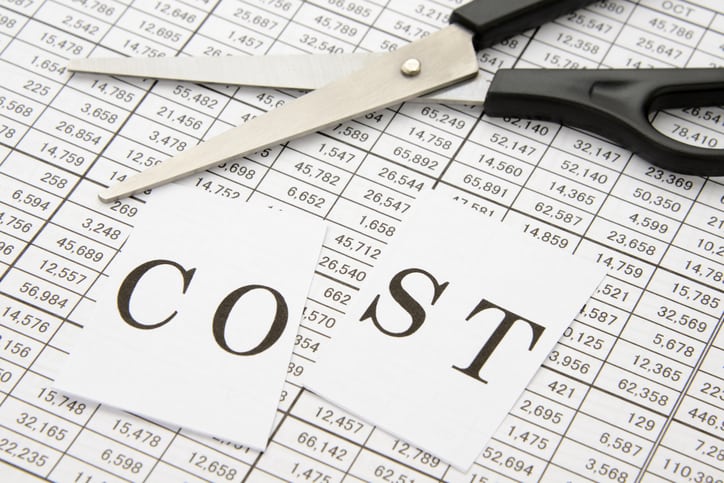 The word cost cut in half to symbolize lower costs