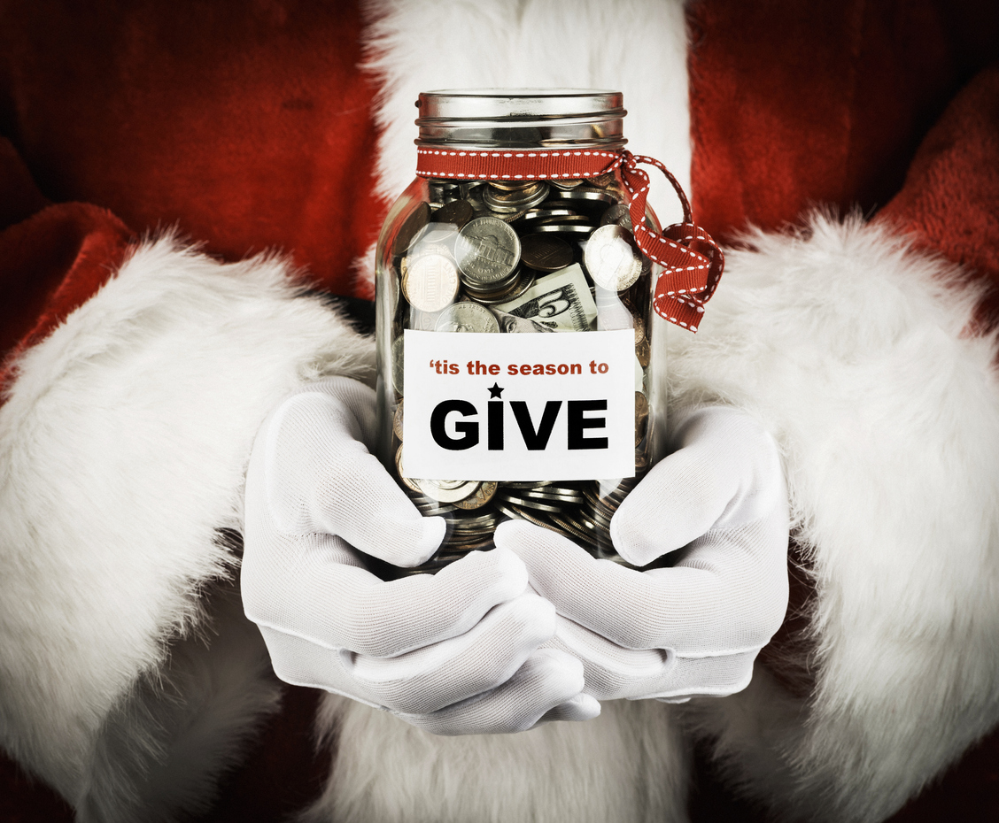 Santa with donation jar in his hands