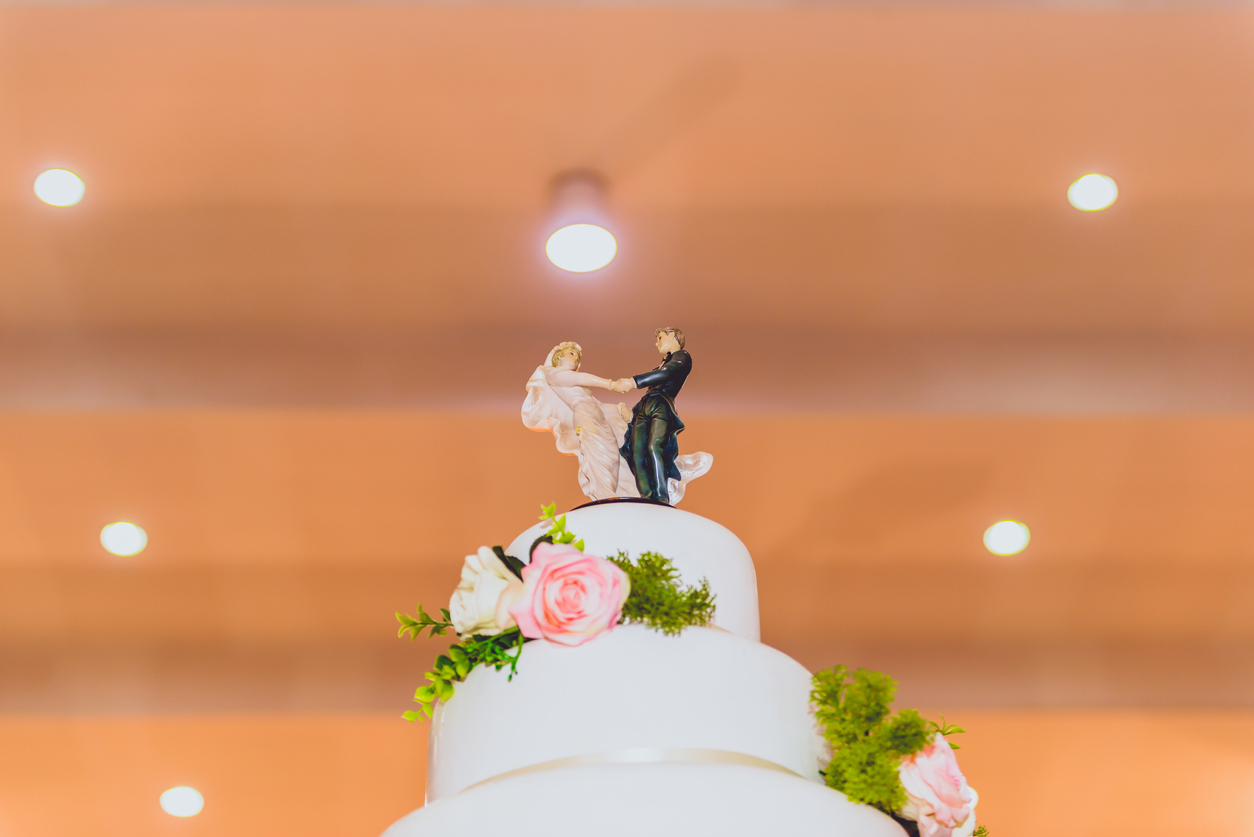 Wedding cake with couple figurine on top of cake