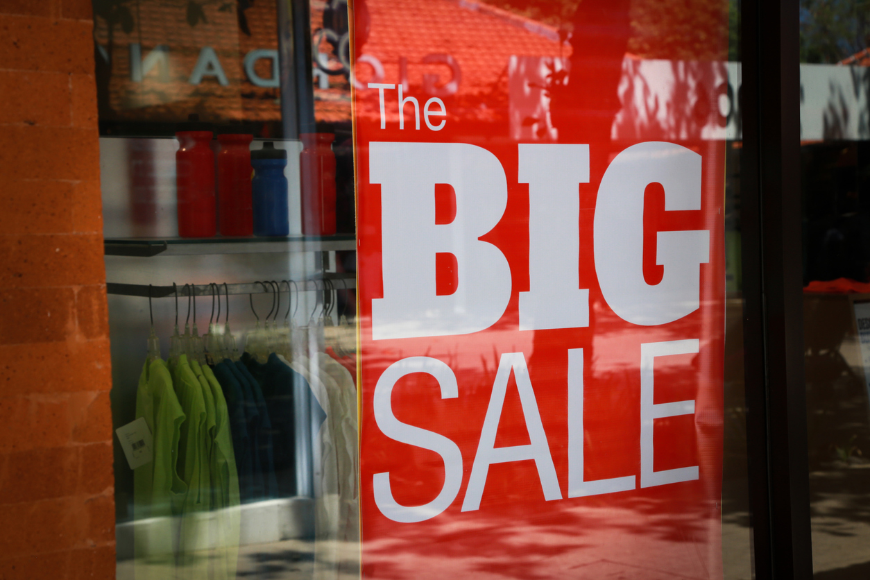 A red banner with text that says the big sale